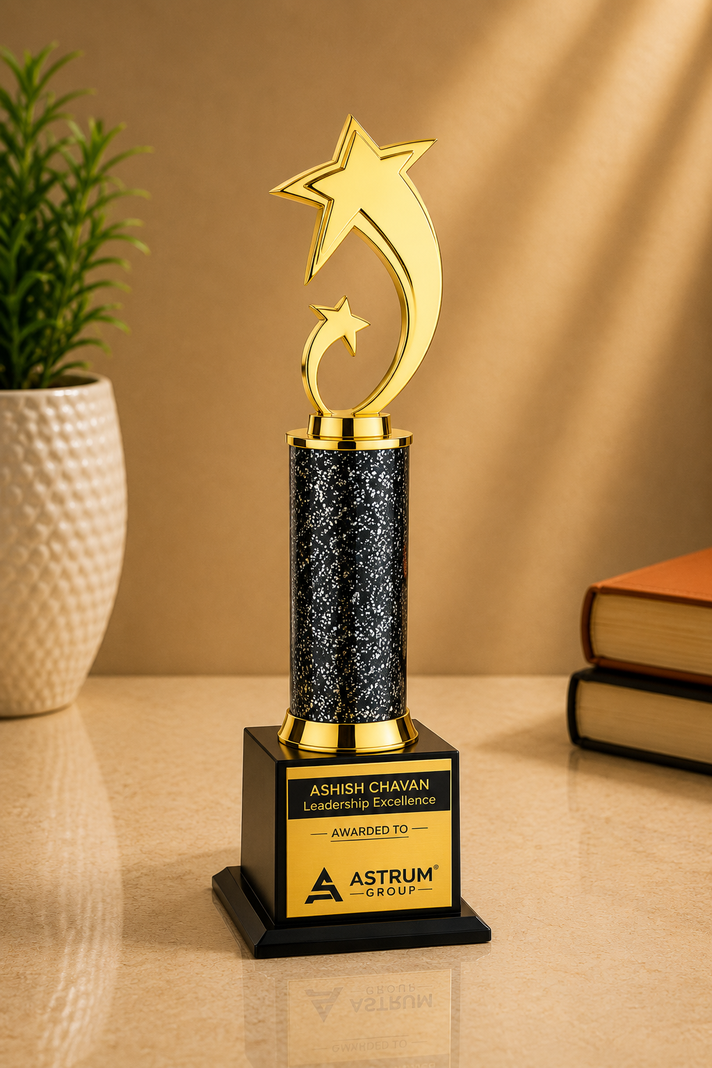 Tall gold-finish trophy featuring a distinctive crescent with two stars, black textured centre column and premium stepped black base with a customizable award plaque.