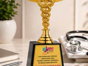16.51 cm gold Caduceus medical excellence award trophy with black base