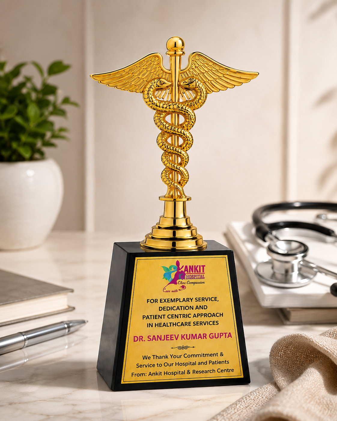 16.51 cm gold Caduceus medical excellence award trophy with black base