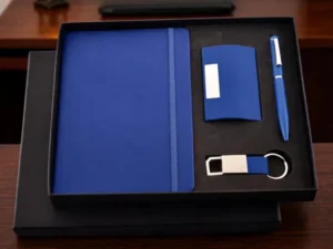 Blue corporate gift set with notebook, pen, card holder and keychain