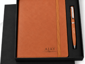 Corporate diary and pen set with a sleek black notebook and matching pen