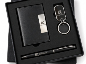 Personalized black corporate gift set with notebook and pen in a sleek presentation box