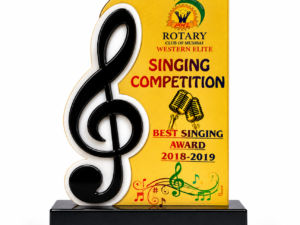 Customized singing competition trophy with yellow panel, music notes, microphone graphics, and black treble clef base