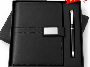 Black pen beside a notebook from a personalized gift set