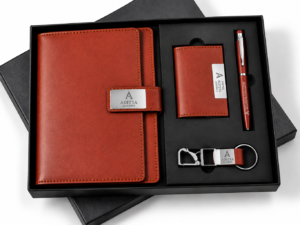 Personalized corporate gift set with brown diary, card holder, and pen